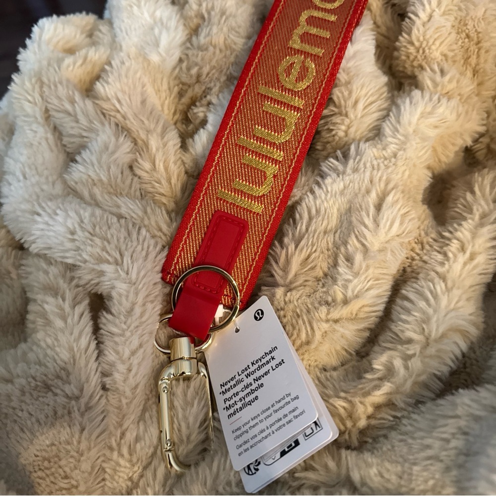 lululemon athletica Red and Gold Branded Wristlet Keychain